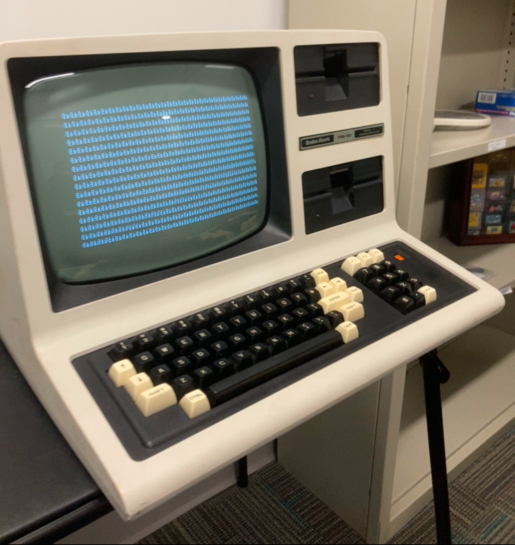 A photo of the TRS-80 with the screen filled entirely with the characters @ and a.
